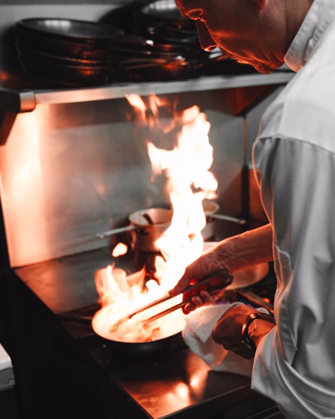 chef cooking fire